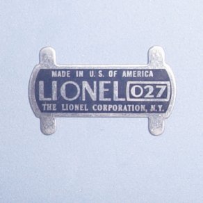 Lionel Train Part 2036M-111 O27 Gauge Collector Pickup Shoe Nameplate.  Lionel Train Parts, Lionel Train Repair Parts and Lionel Train Replacement Parts in stock for fast shipping.